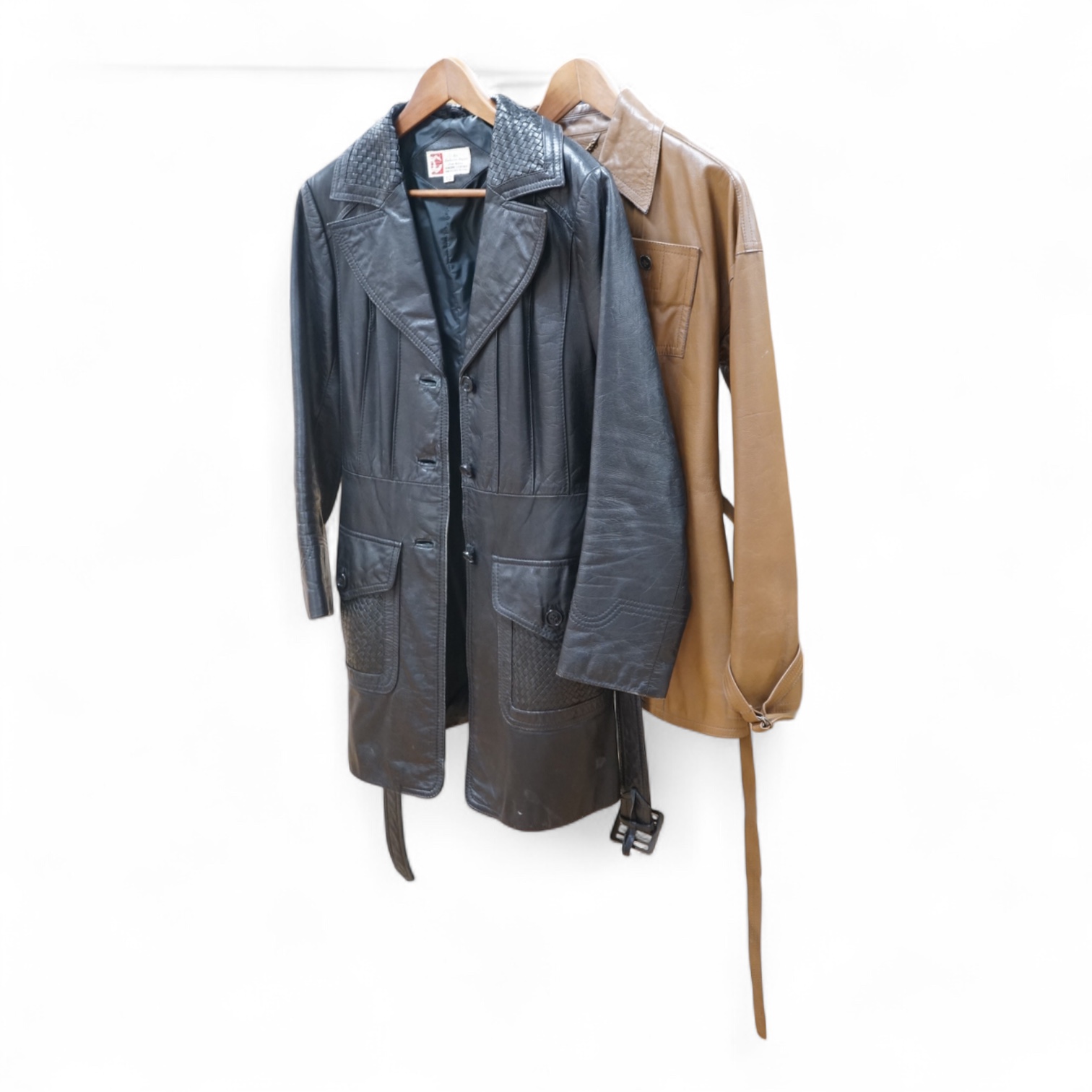A Baccarat tan leather jacket and a black close-fitting Korean leather jacket size 10